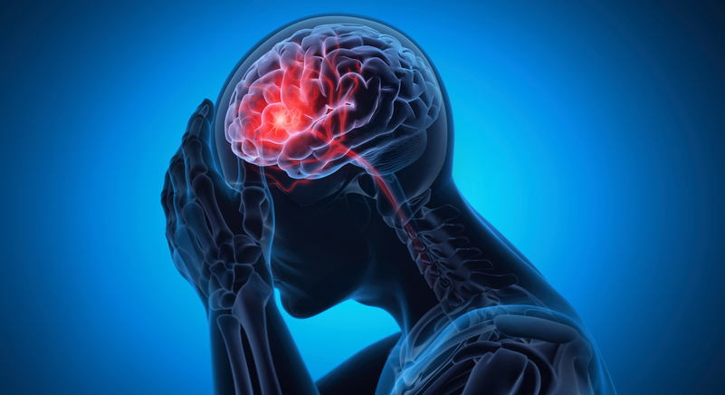 Person holding head with highlighted brain injury